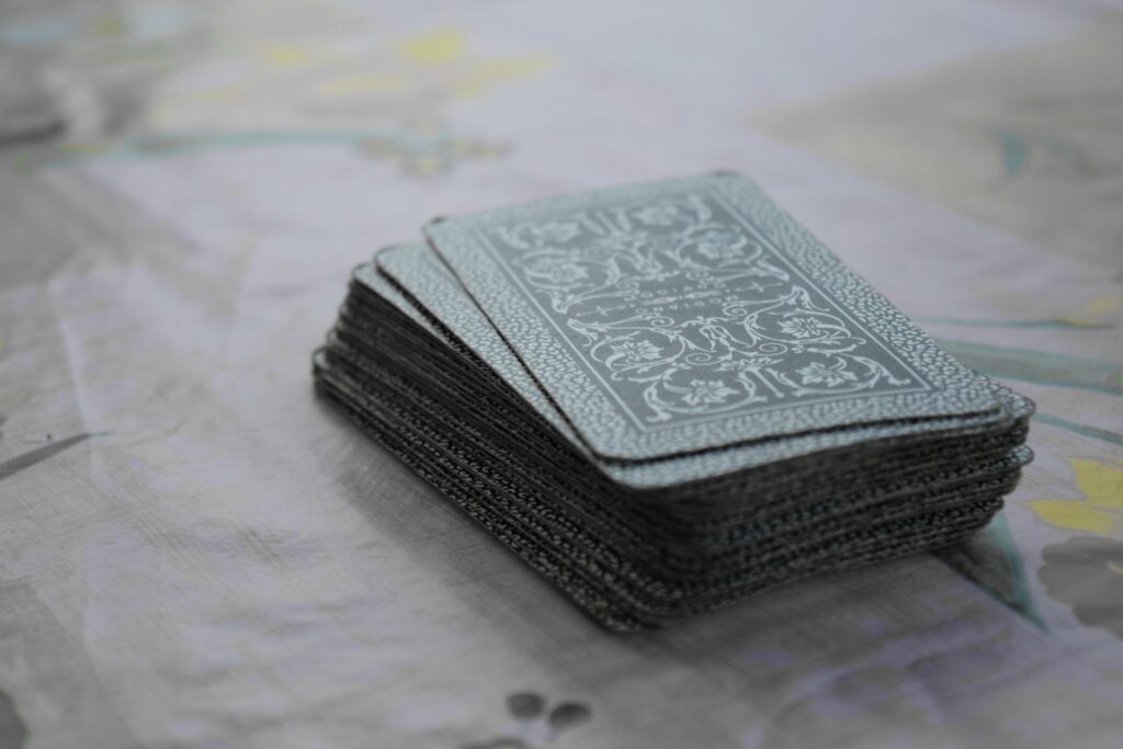 A vintage deck of cards on a table