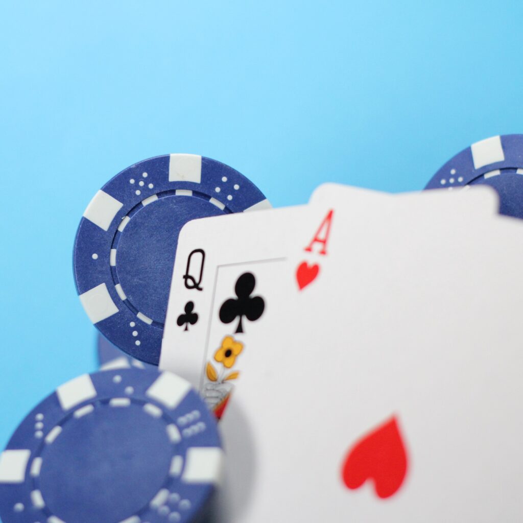 A blackjack with chips around it