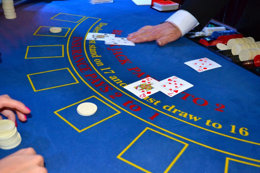 A blackjack table with somebody playing at it