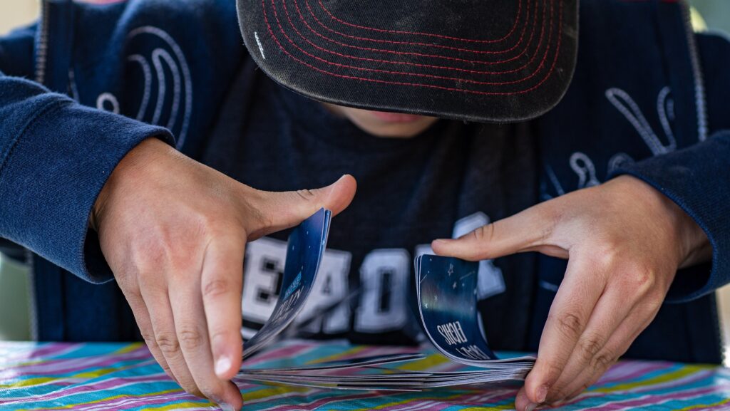 A man shuffling cards
